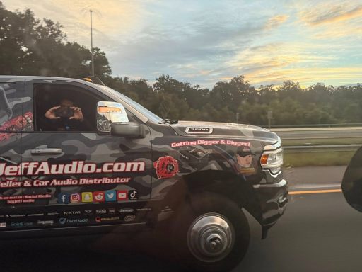 Photo of me in a car taking a picture of another car